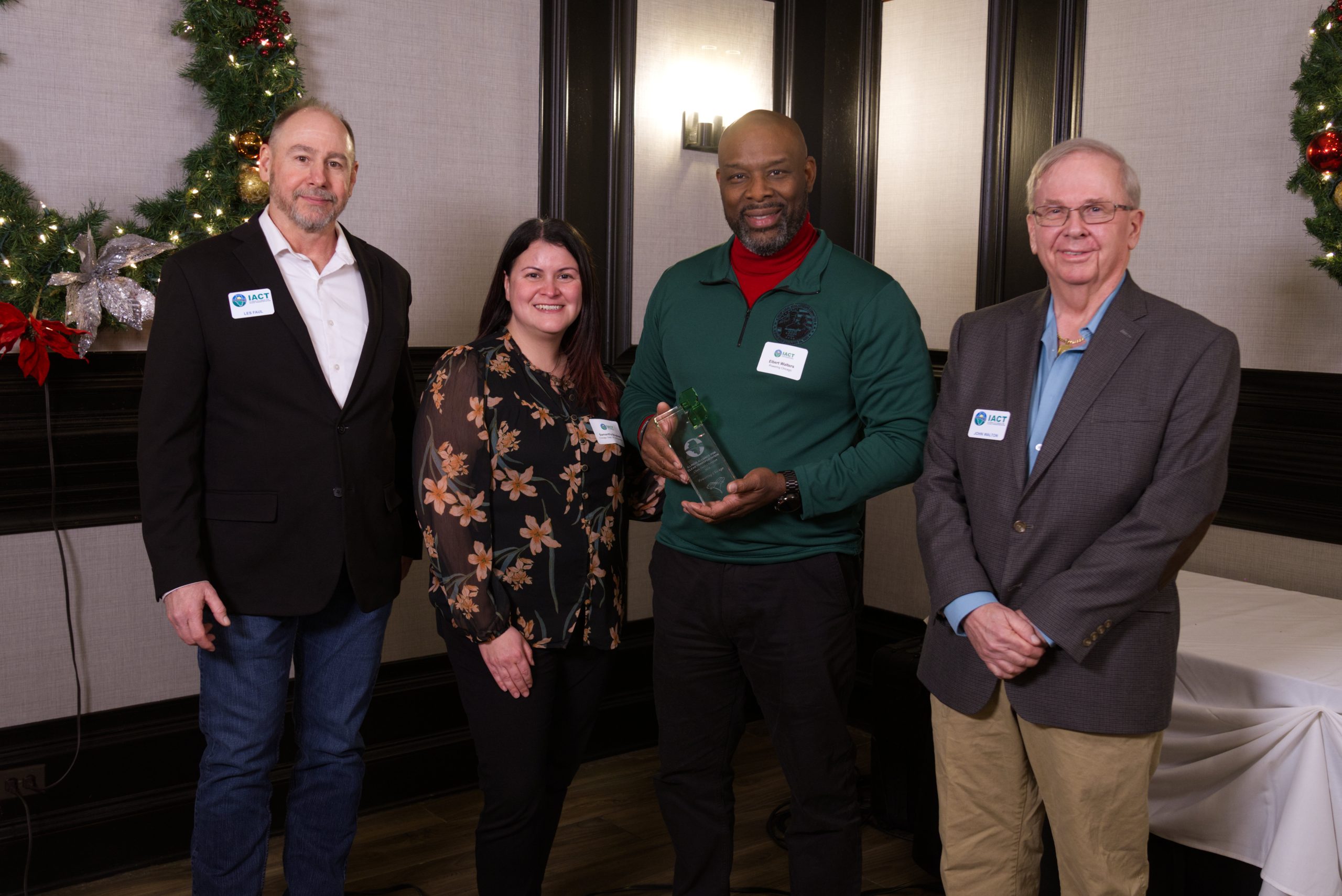 Elbert Walters II from Powering Chicago accepts the Clean Fuels Champion award from IACT